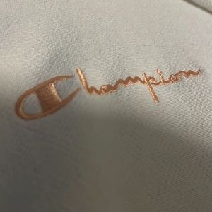 Champion. White. Pink accents stripes. Size small